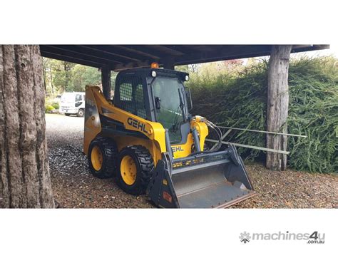 gehl skid steer with bobcat auger|used gehl skid steer.